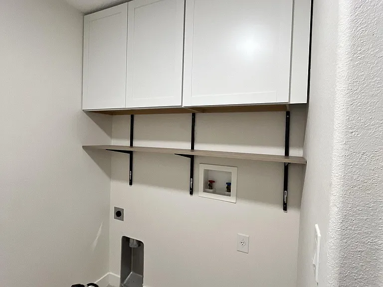 Laundry room and mud room with entry from garage