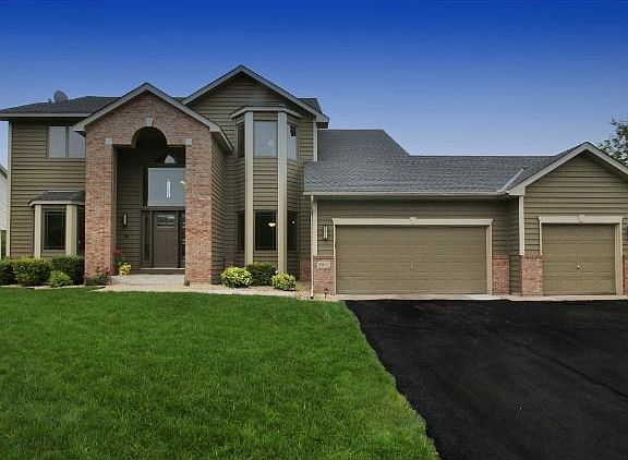 Stunning high quality built home with gorgeous pool overlooking serene wetlands and trees