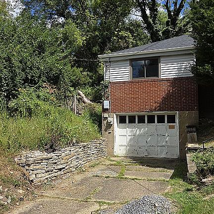 View of garage/driveway