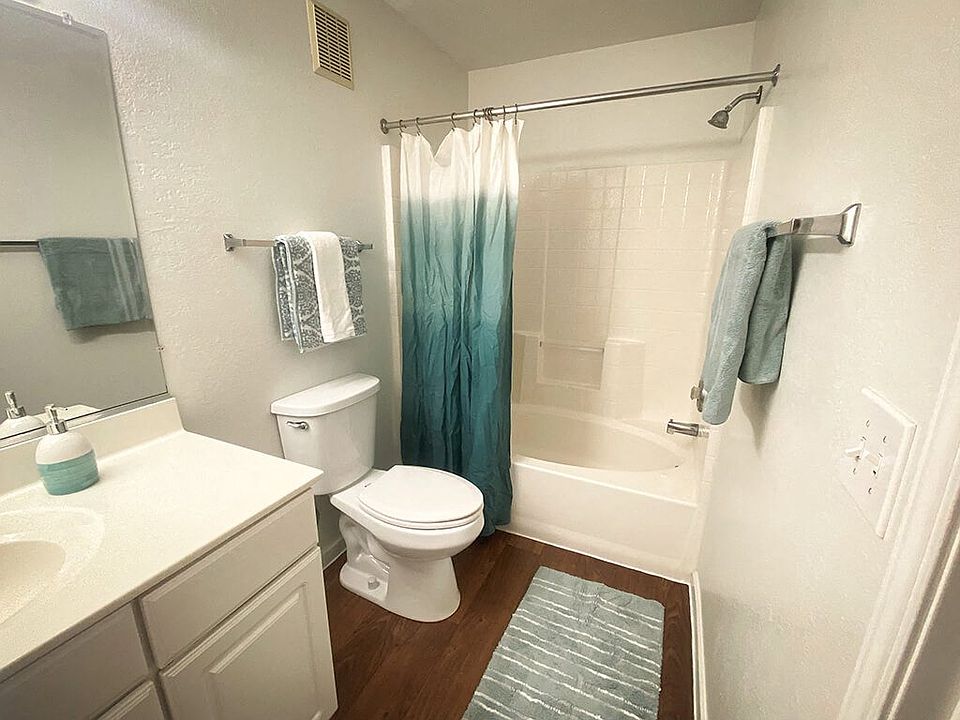 Full Bathroom with Wood Style Flooring