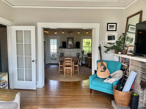 Double Pocket-Doors separating Living Room & Dining Room allow one to close off one room to create 2nd Bedroom or Office.
