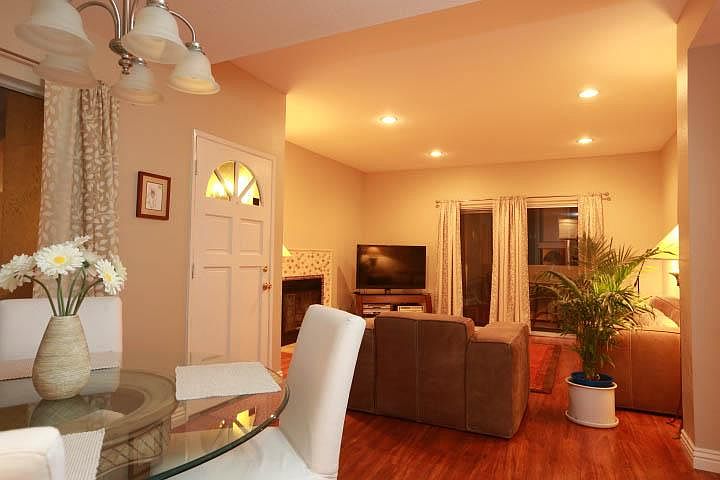 Fireplace in the large living room. Opens to front patio wit