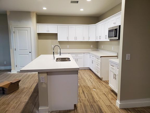 Closer side view of unfinished kitchen