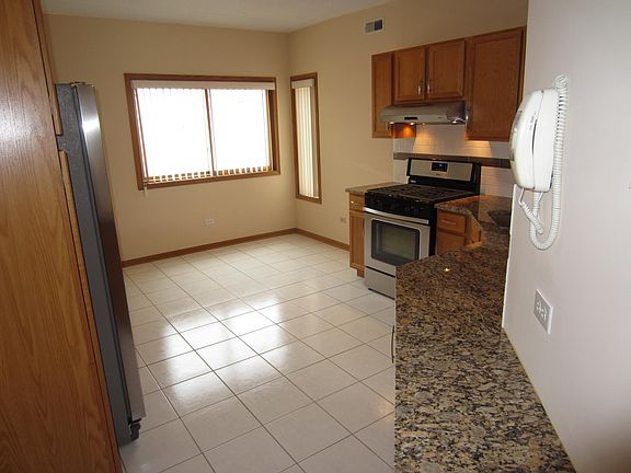 5th image of 9437 S 79th Ave APT 203