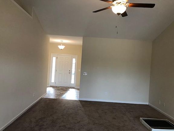 Living room showing towards the front entrance