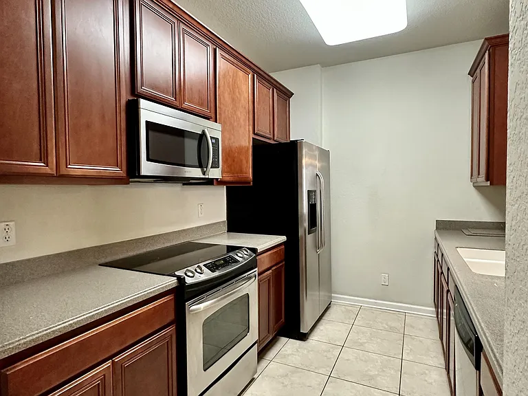 3338 Robert Trent Jones Dr #1-210 — Photo 4