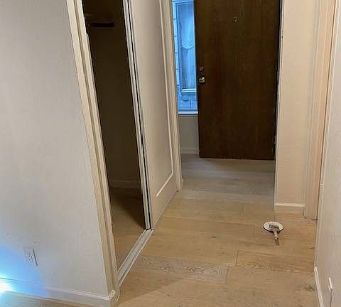 New hardwood floors and closet doors.