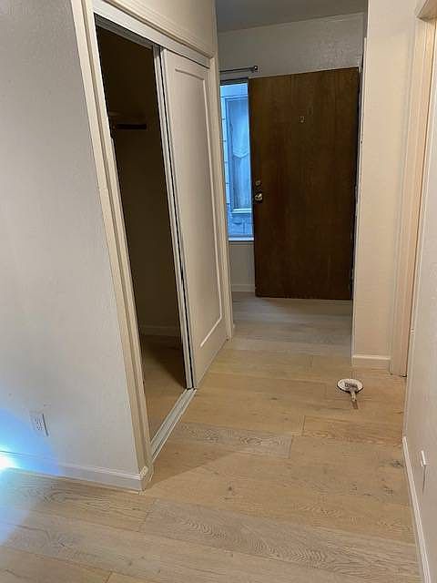 New hardwood floors and closet doors.