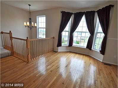 Large floor-to-ceiling Bay Window expands space