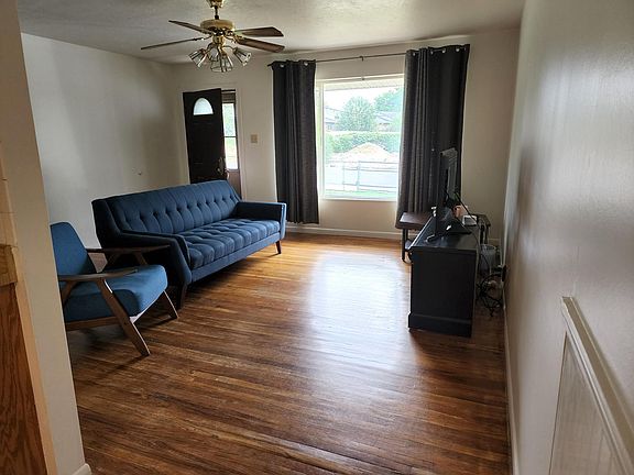 Living room and part of dining area.