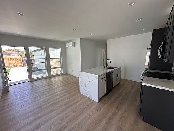 Kitchen and living room facing front yard