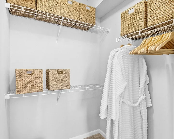 a walk in closet in a classic unit at Harbor Pointe, New Jersey, 07002