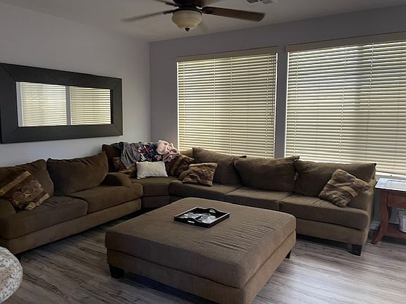 Family Room - perfect size couch included! The rest of the house is unfurnished.