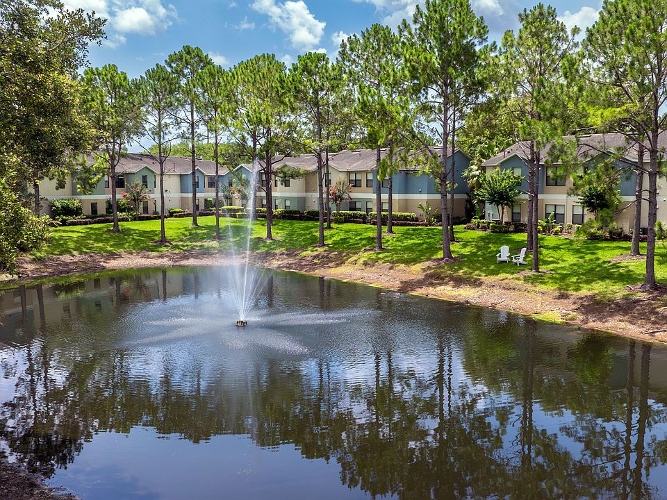Enjoy the relaxing sounds of the fountain and the serene beauty of nature, right outside your door at Harper Grand.