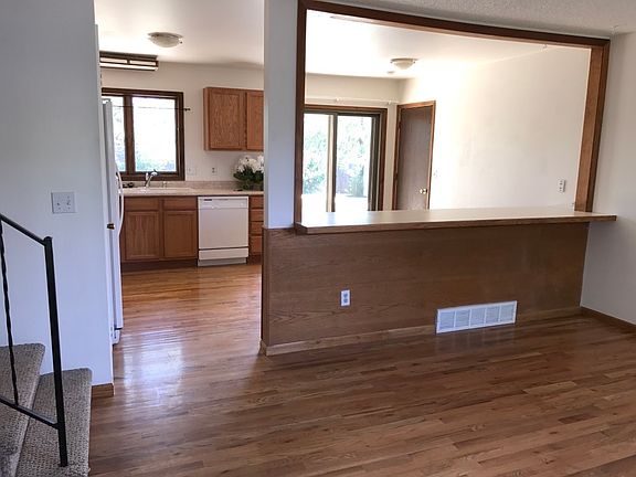 Living room to kitchen with hardwood floors