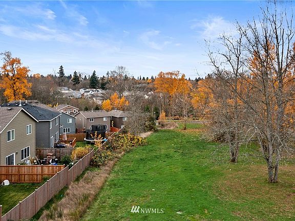 You can see the buffer of vacant land here behind the homes.