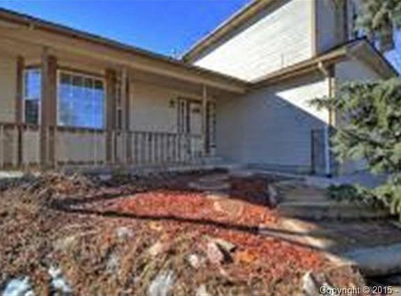 Covered Front Porch with Flagstone Pathway