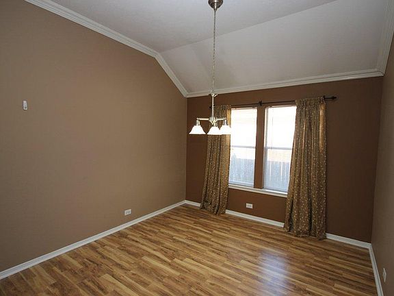 Formal dining room large enough for families & guests.