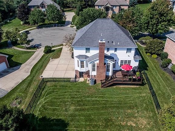 From the level driveway, to the mostly level fenced back yard, the lot is outstanding!