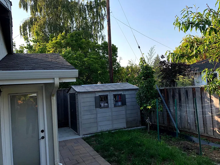 Large storage shed in the backyard.