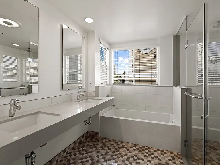 Handicap Accessible Bathroom with Double Sink, Stand-Up Shower, and Full-Size Bathtub