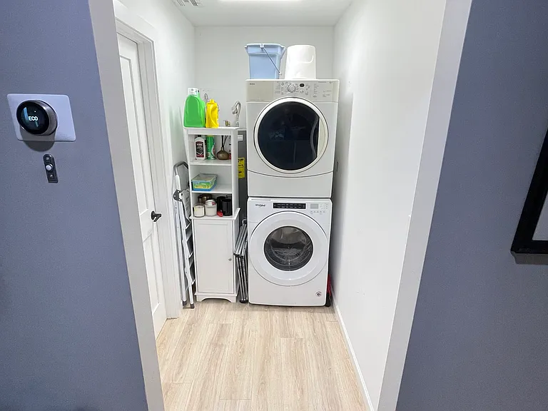 Laundry room with washer and dryer