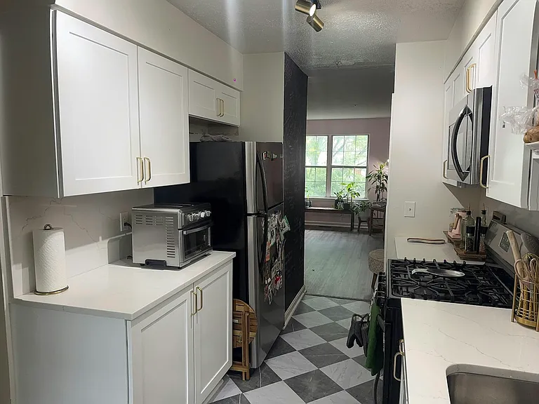 Galley Kitchen with standard refrigerator