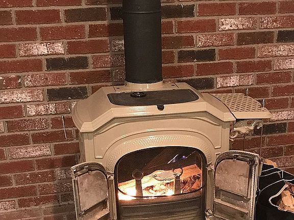 Lower level wood stove 