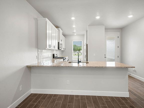 The kitchen has a window that allows in great, natural light.