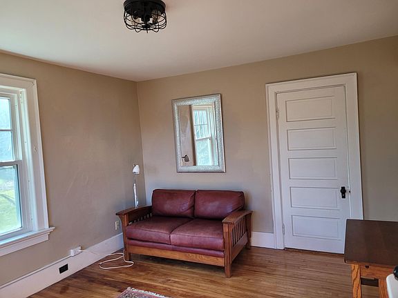 Living area with door to Bathroom