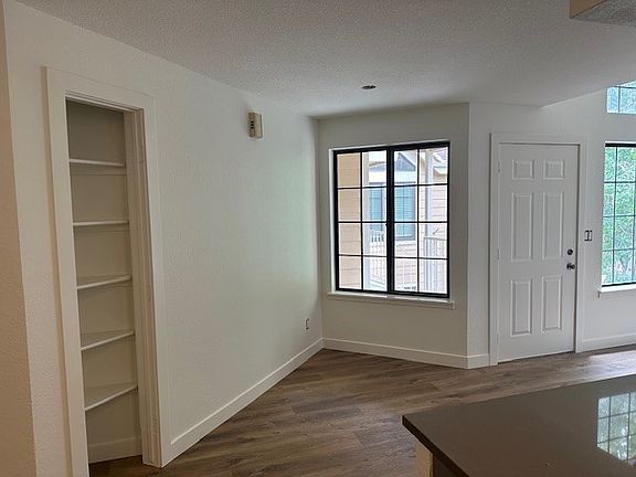 Looking from kitchen to dining area & back patio