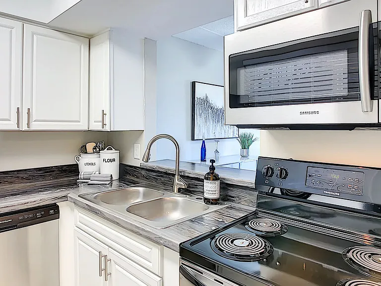 Fall in love with our kitchens adorned with gleaming stainless steel appliances. Cook and create in a space that embodies elegance and function.