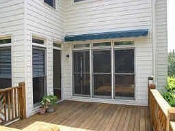 Rear deck features electronic awning to create the perfect setting