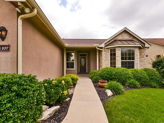 107 Great Frontier Dr-large-004-Exterior Front 004-1500x994-