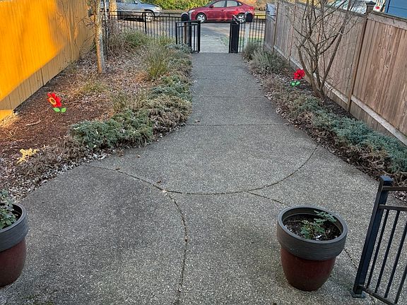 Tenants share the responsibility of keeping pathway clear of snow and leaves and watering and weeding plants as needed.