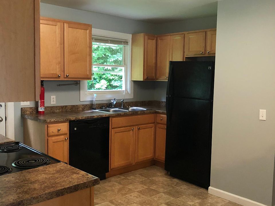 Kitchen including Electric Stove, Microwave, dishwasher and Refrigerator.