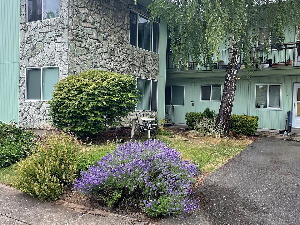 Second floor unit with green spaces right outside your door