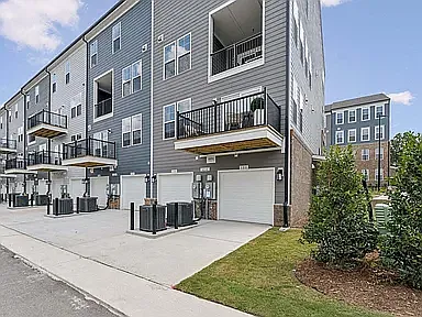 The one-car garage flows directly into the kitchen for added convenience and features ample storage areas for all your tools, sports equipment, and other belongings.