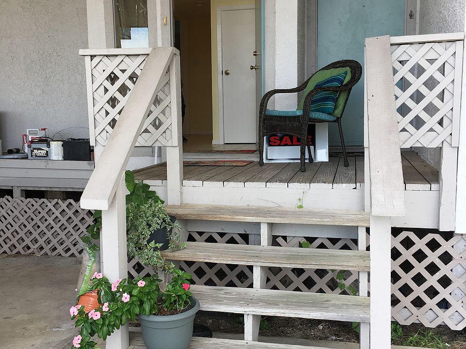 Covered parking, front door.