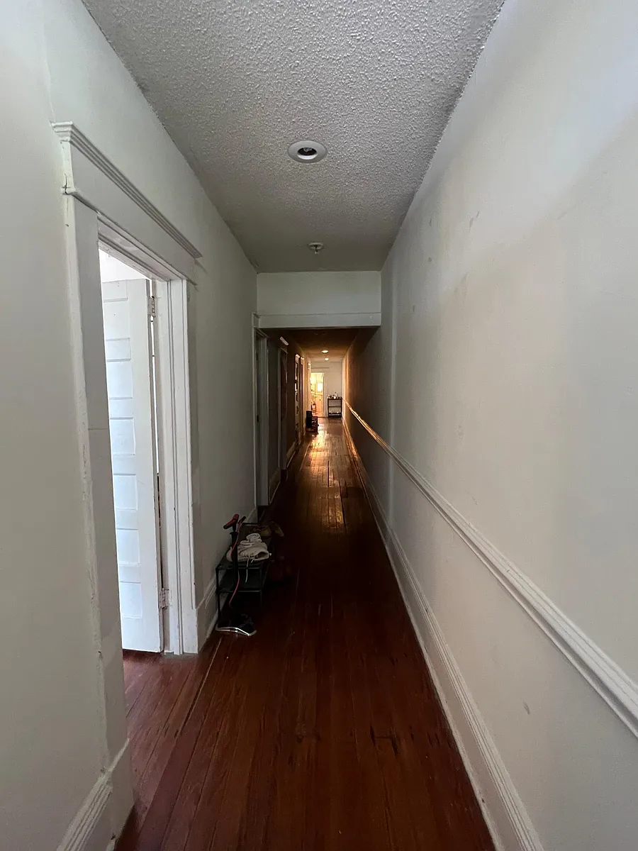 Immediately inside the front door. - 119 Ashley Ave #A