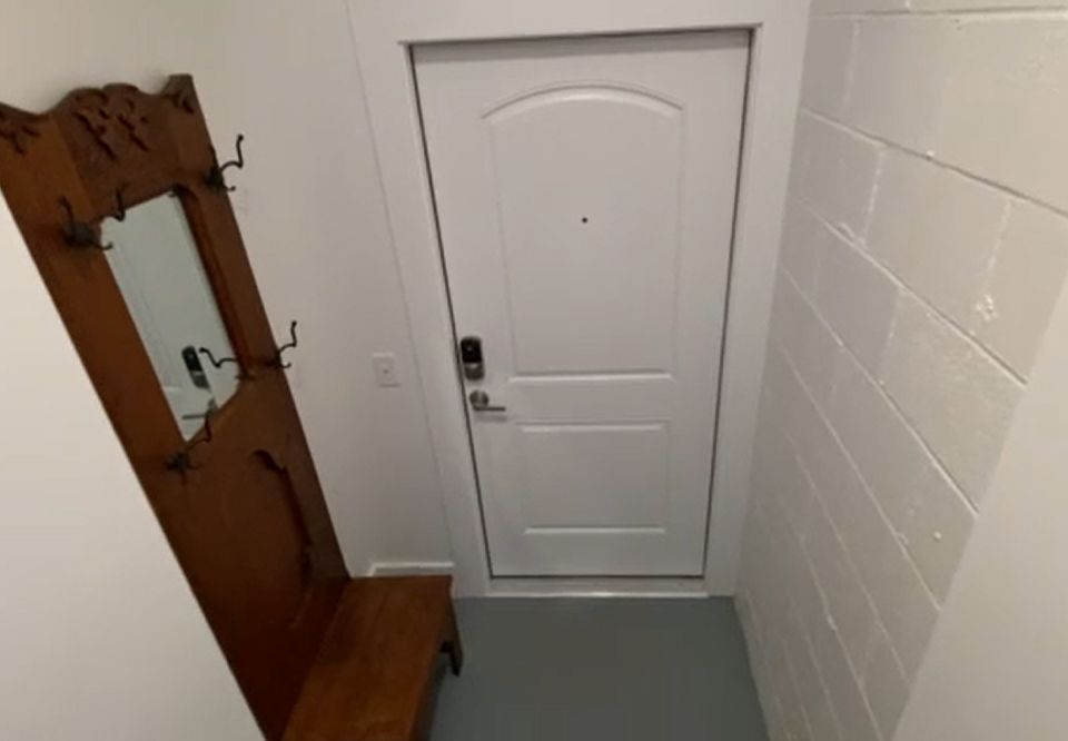 Entryway at base of stairs.