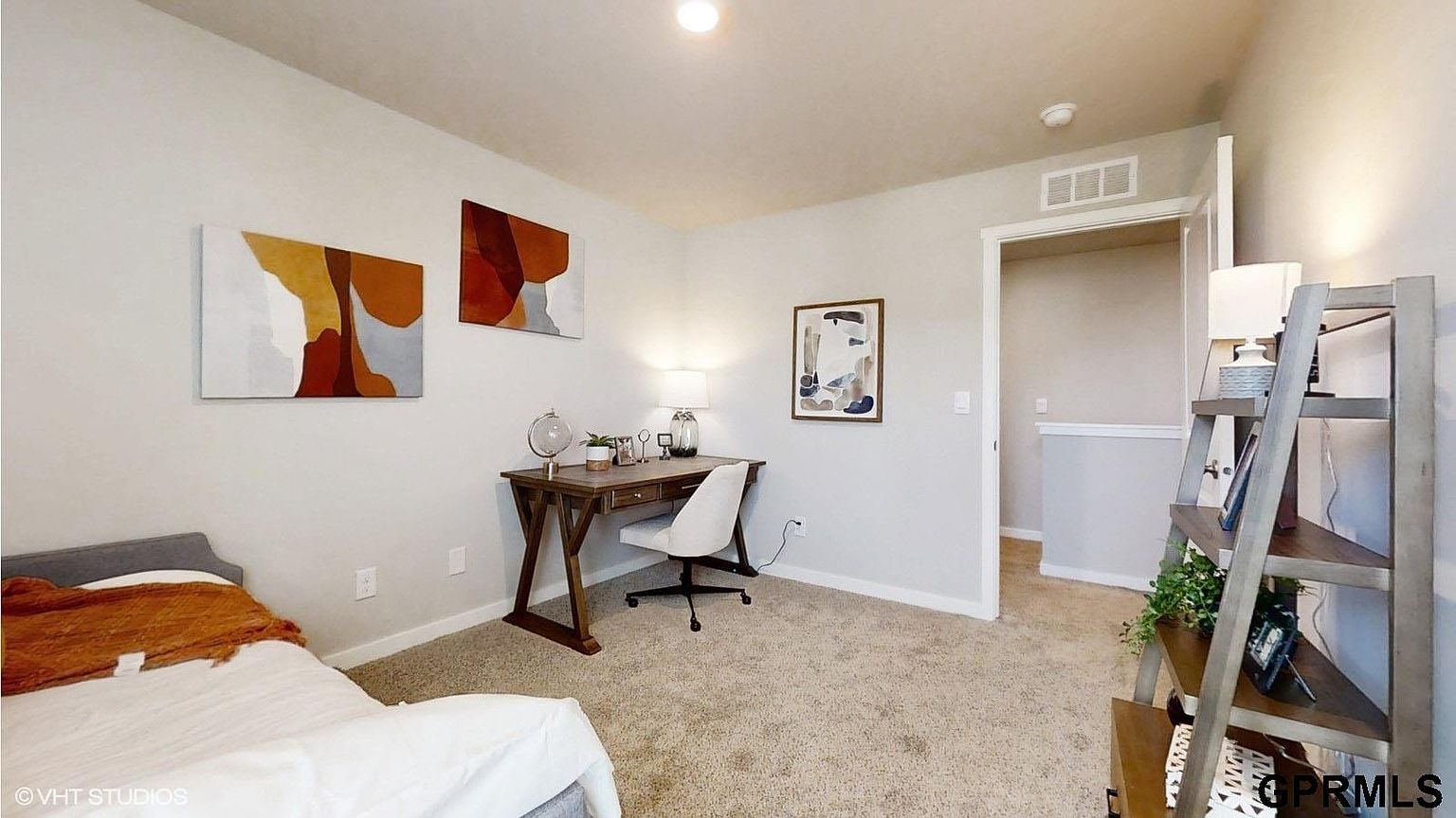 Office with ladder bookshelf