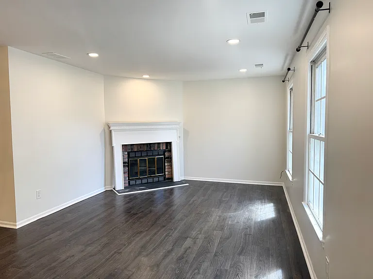 Living Room with wood-burning fireplace