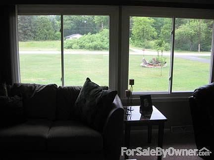 View from road
						:
						Large 1.2 acre lot with landscaping