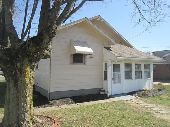 Back Side w/enclosed porch