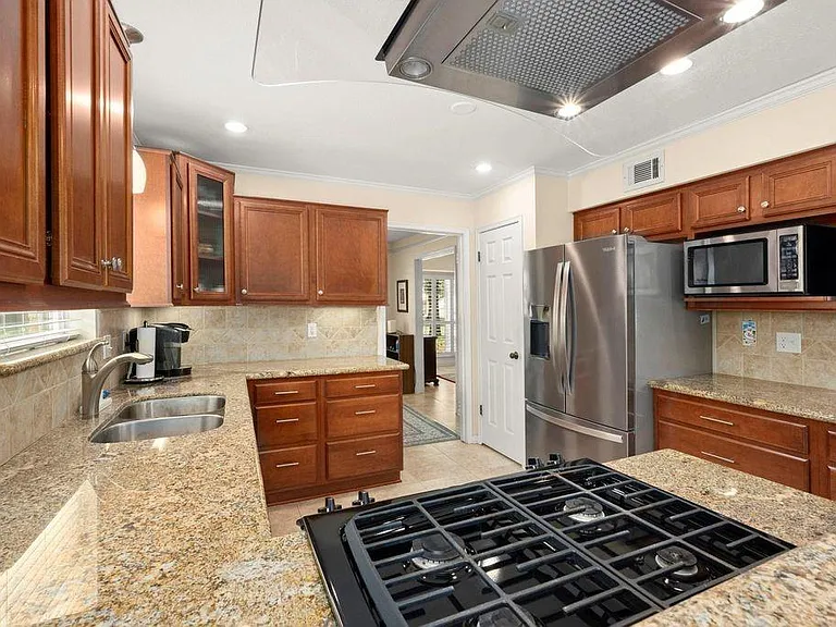 7615 Litchfield Ln — Photo 12