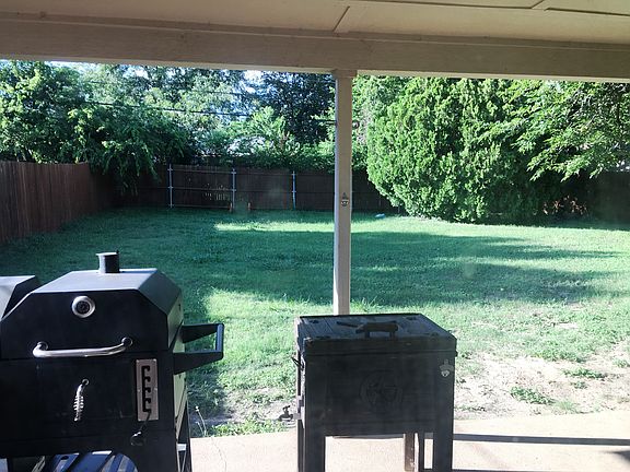 Large backyard with new fence