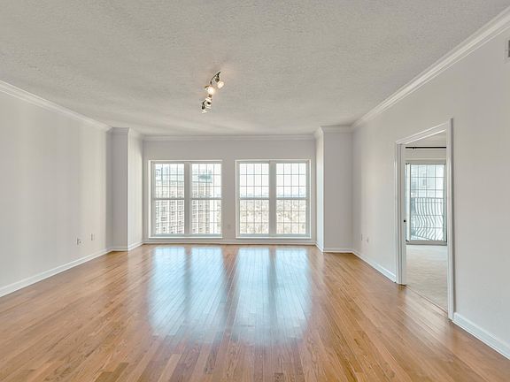 real hardwood flooring, freshly painted throughout