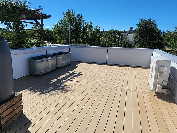 Spacious rooftop with brand new deck.