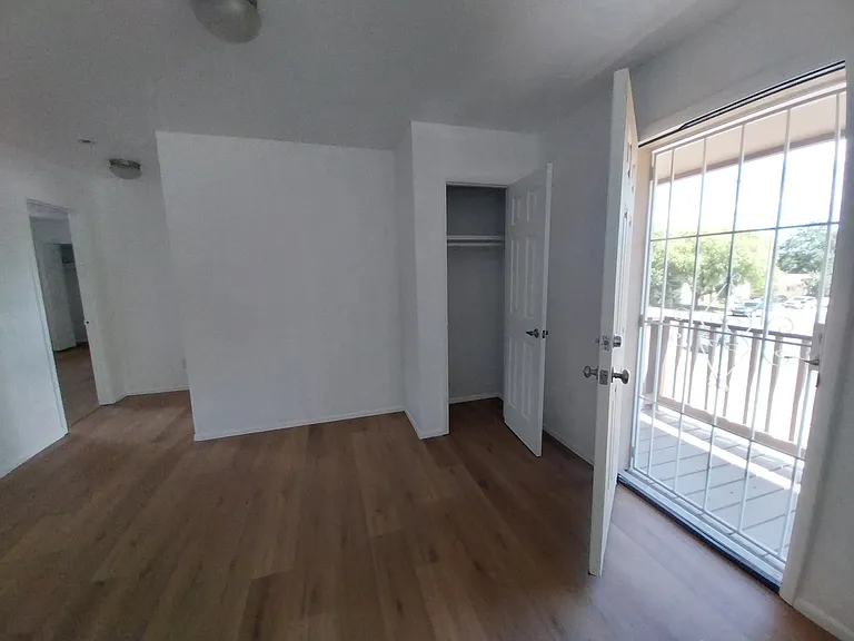 Front door opens onto deck with lockable security screen door, coat closet just inside front door